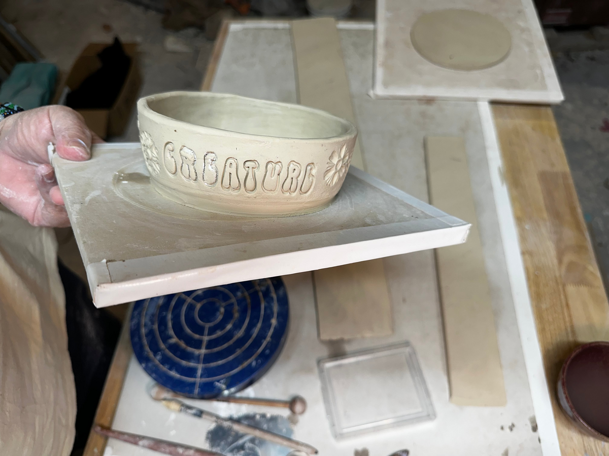 Hand built cat food bowl with name
